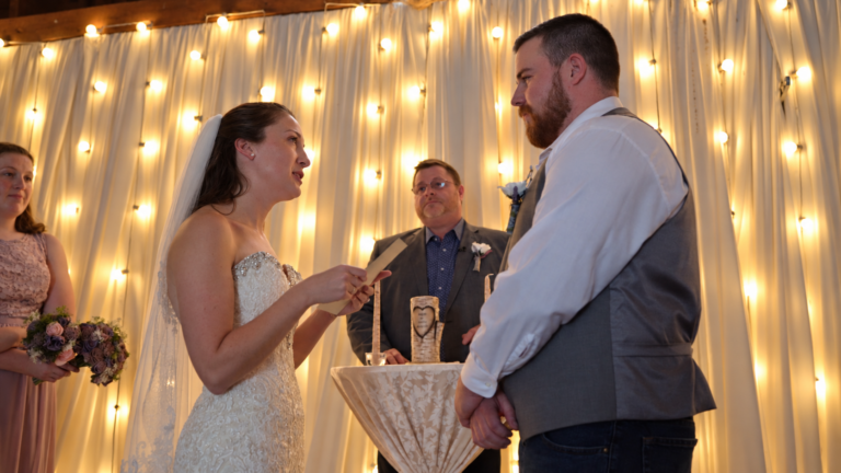 Ashley reads personal vows to Adam at their wedding
